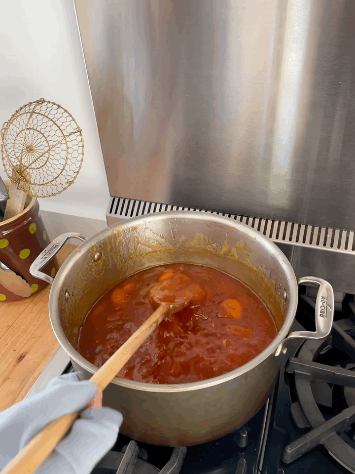 Apricot jam cooking in a pot