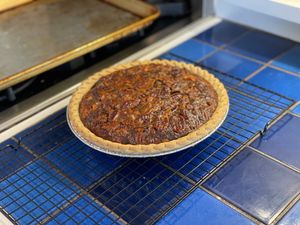 Pony pie resting on a rack