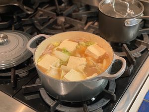 Tofu simmering in soup