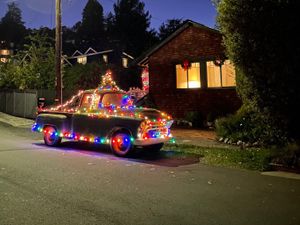 An Old Truck Decorated with Christmas Lights