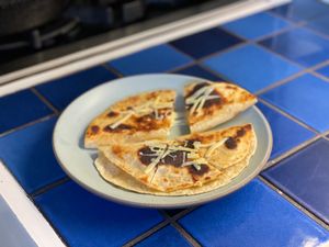 Two quesadillas on a plate