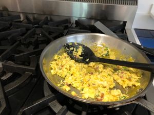 scrambled egs in a metal pan