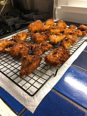 fried chicken on a cooling rack