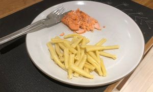 salmon and pasta on a plate
