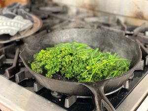 Brocollini in a pan