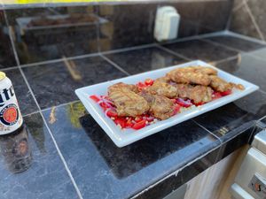 Chicken on corn  tomatoes