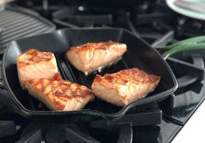 Salmon after coming out of the oven on a grill pan