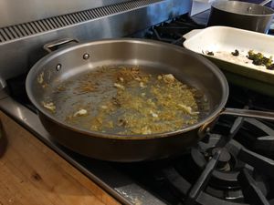 A pan with stuck on fish